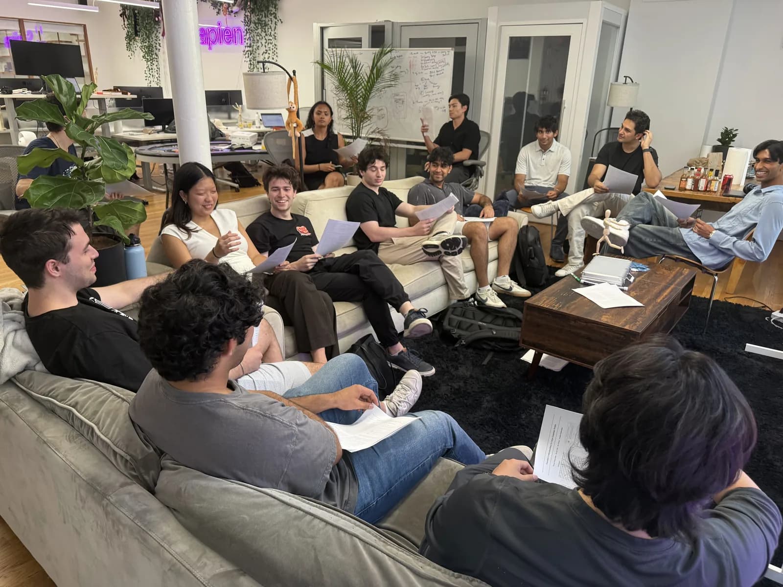 Sapien team discussing a paper in the AI reading group