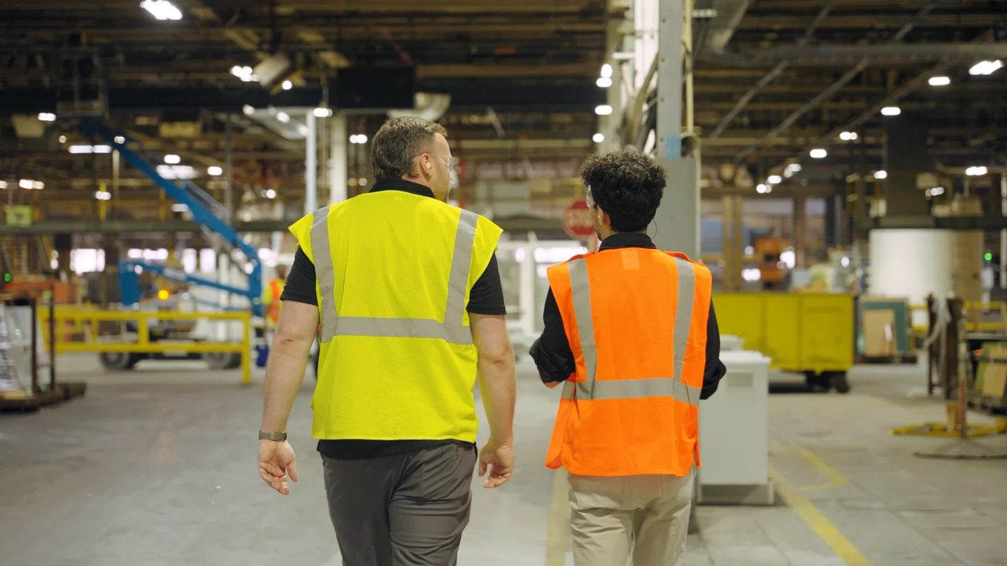 Carlex and Sapien team members walking through the factory